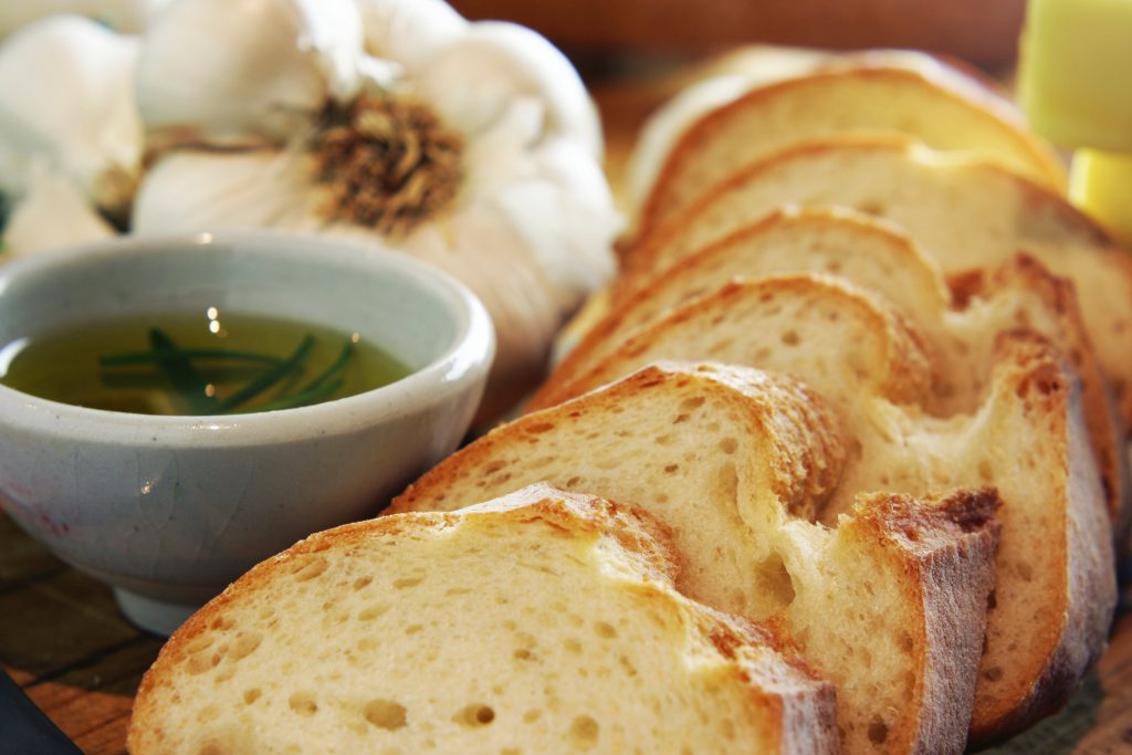 Tuscan specialties: bread rubbed in garlic and and dipped in olive oil